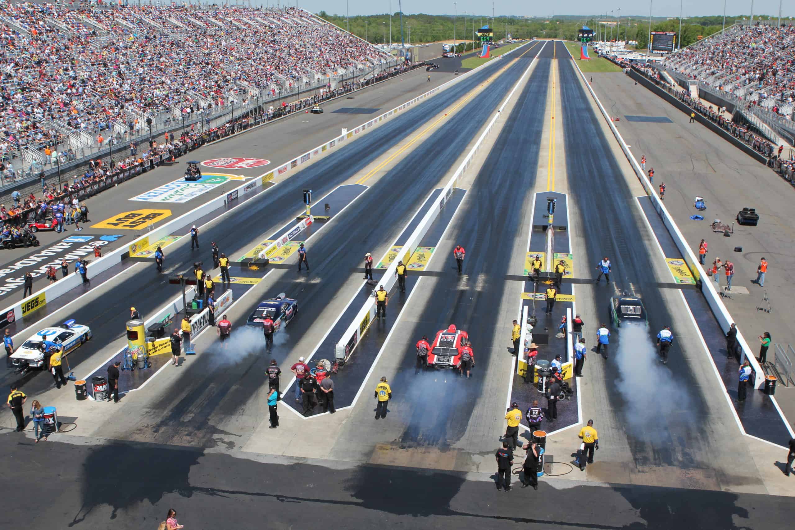 Dragsters race on the four-lane drag strip in Concord, North Carolina