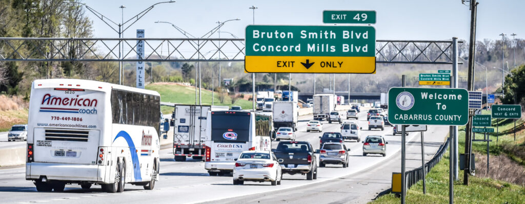 vehicles and signs on interstate