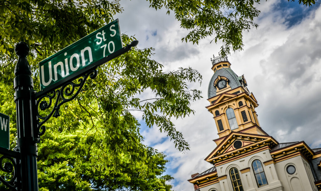 historic courthouse building and street sign